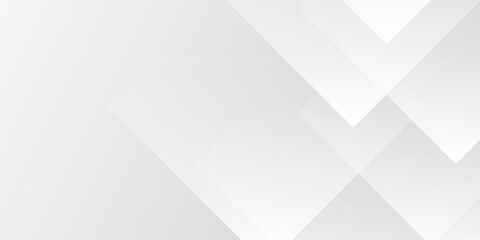 Obraz premium Abstract geometric background with white and gray triangles, perfect for digital presentations and design projects