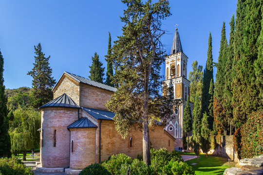 Historic Monastery of St. Nino at Bodbe in Kakheti, Georgia. Ancient brick church architecture beautiful garden
