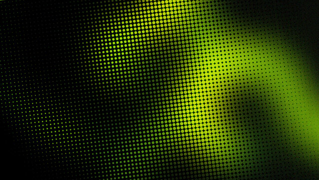 Abstract yellow halftone dots pattern on black background