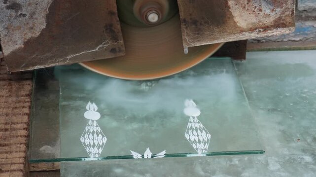 Industrial glass cutting with precision diamond wheel