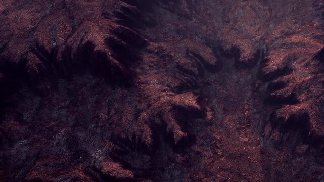 The scene shows a rugged landscape with hills and valleys on a planets surface. The ground has a reddish brown color and varies in height, indicating geological features.
