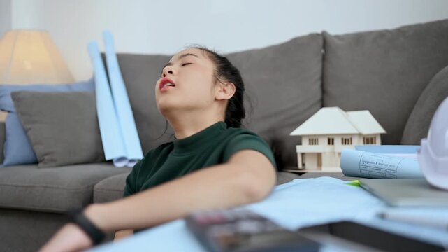 Overworked architect resting during a demanding construction project