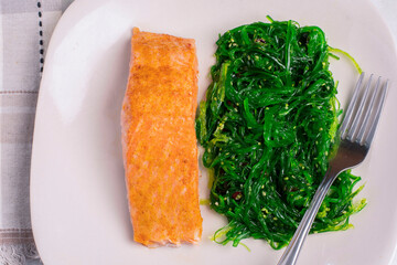 baked salmon  with  seaweed salad © dmiller324