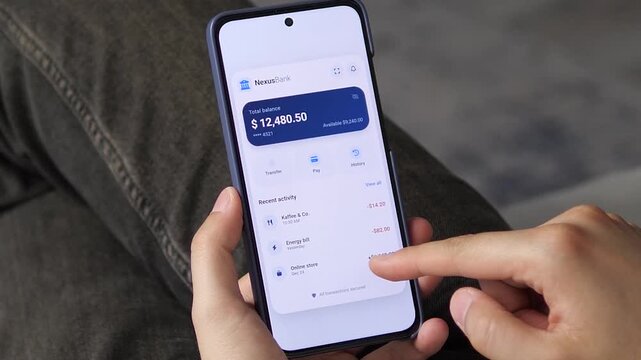 Mobile banking dashboard displaying a 12,480.50 usd balance and recent transaction history. User reviews spending and income. Perfect for personal finance apps, budgeting tools,