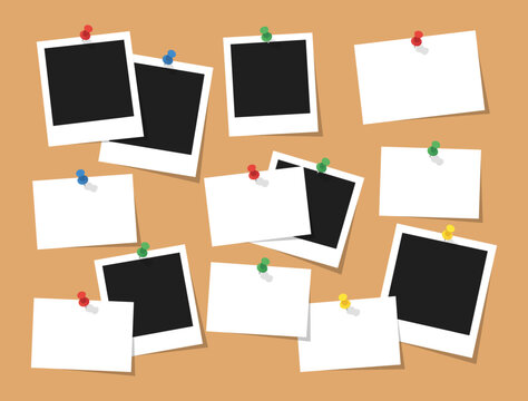 Blank instant photo frames and paper notes pinned to a corkboard