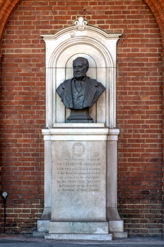 LONDON, UK - JULY 11, 2026:  Memorial bust to Sir Clements Markham beside door to the Royal Geographic Society building in Exhibition Road, South Kensington
