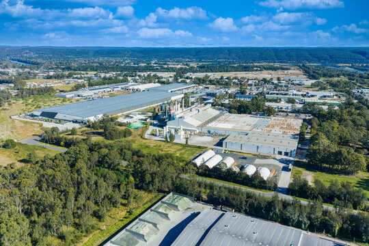 Drone aerial photograph of industrial buildings and the surrounding infrastructure and warehousing and urban development in the Greater Western Sydney town of Penrith in New South Wales, Australia