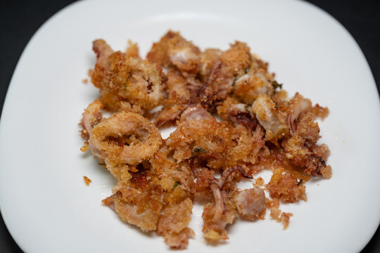 Tasty and light baked squid au gratin