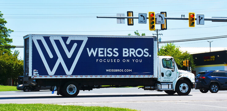 Truck with Weiss Bros sign on the street, Virginia, USA
