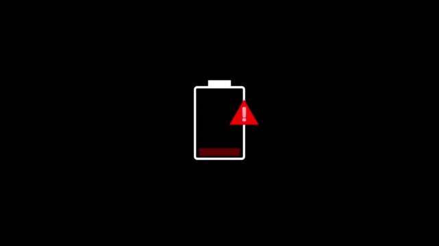Warning alert notification icon on smartphone low battery animation isolated on black background.animation with alpha channel low battery red icon