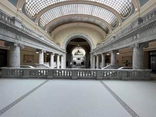 Symmetrical interior view of the neoclassical dome and grand arches inside the Utah State Capitol Building in Salt Lake City © Carrie
