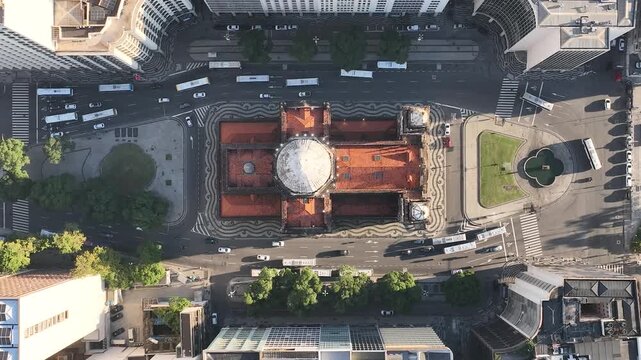 Rio de Janeiro in sunrise, Brazil. City center. Aerial view, establishing shot. Get&uacute;lio Vargas Avenue. Candelaria church