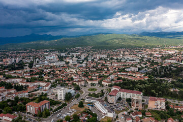 Obraz premium Aerial panoramic view of Niksic town and surrounding mountain landscape, Montenegro