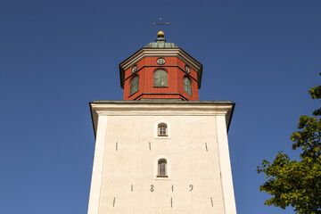 Fototapeta premium Historic Thorslunda church tower dated eighteen nineteen on Oland Sweden