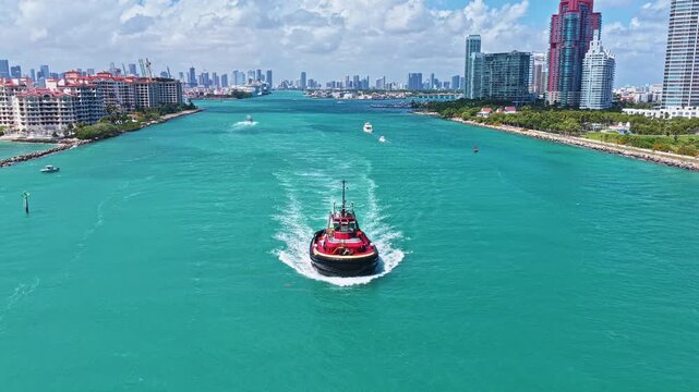 Tugboat sea transportation. Boat tug at sea. Aerial footage of tow boat transportation. Aerial footage. Tugboat sailing at sea top view. Motor boat. Boating and tugging