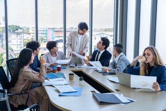 Successful happy workers Group of business people with Multiethnic workers with in company workers Group of asian business people and support Teamwork in the meeting room at modern office.