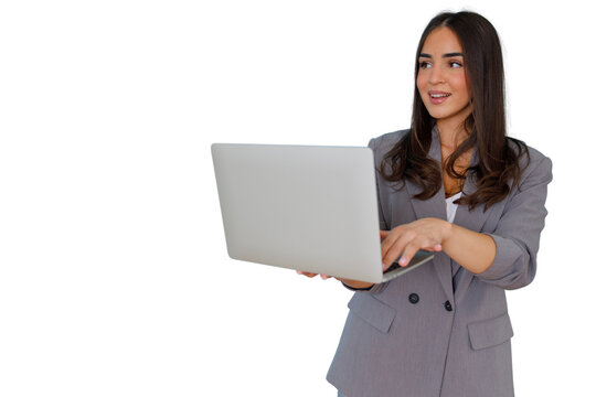 Smiling businesswoman holding laptop and typing, looking away, with a transparent alpha channel background