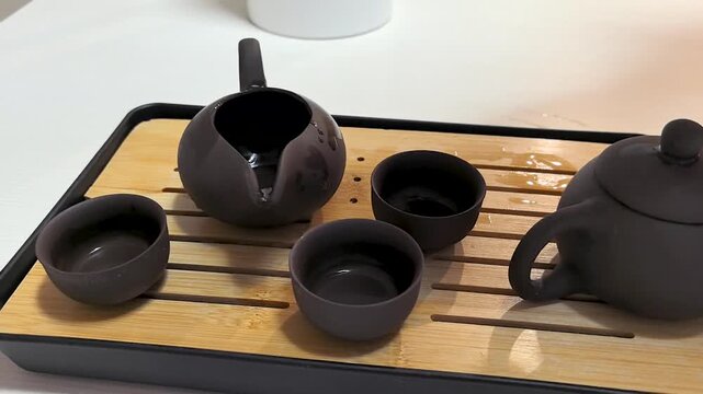 Elegant tea ceremony unfolds with meticulous preparation and graceful rituals