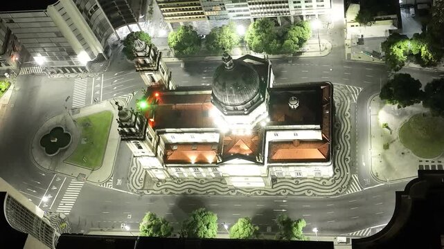 Rio de Janeiro at night, Brazil. City center. Aerial view, establishing shot. Candelaria church in time lapse