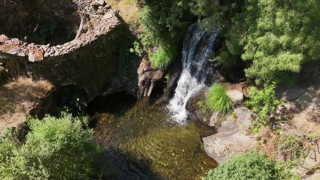 Aerial views of the Mondego footbridges and waterfalls, Videmonte in the municipality of Guarda, within the Serra da Estrela Natural Park, Portugal.