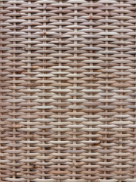 Handwoven natural reed basket weave texture with horizontal braided strands
