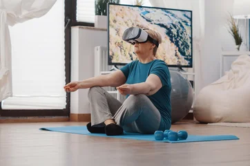 Fotobehang Lotusbloem Retired woman meditates in lotus position on a yoga mat while wearing a virtual reality headset, using immersive technology for relaxation and senior wellness.  © DC Studio