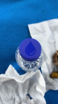 Water logo with blue color on bootle