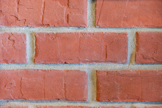 Close-Up of Classic Red Brick Wall Texture with Traditional Masonry Pattern
