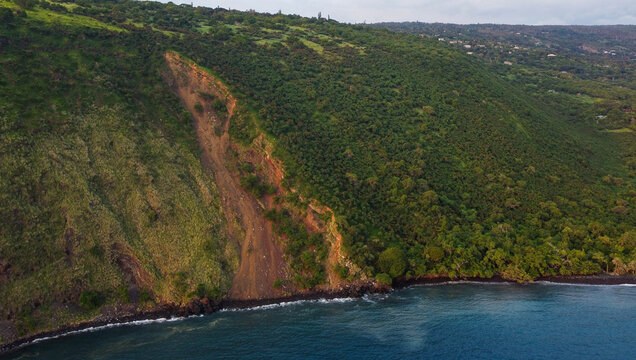 Drone aerial view of coastal landslide on the cliffs of Captain Cook, Big Island, Hawaii