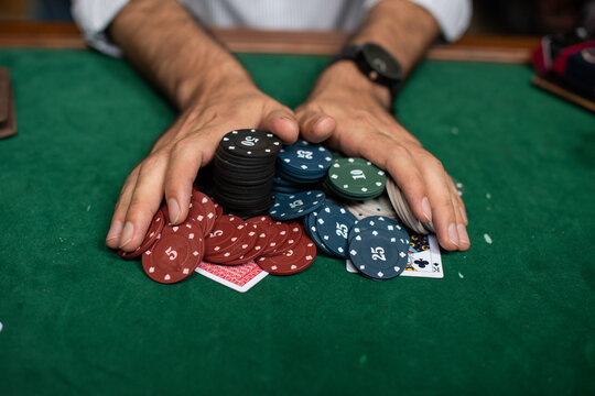 Poker chips on green table