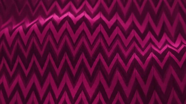 A dark magenta fabric with a repeating chevron pattern creates a soft and elegant wave effect
