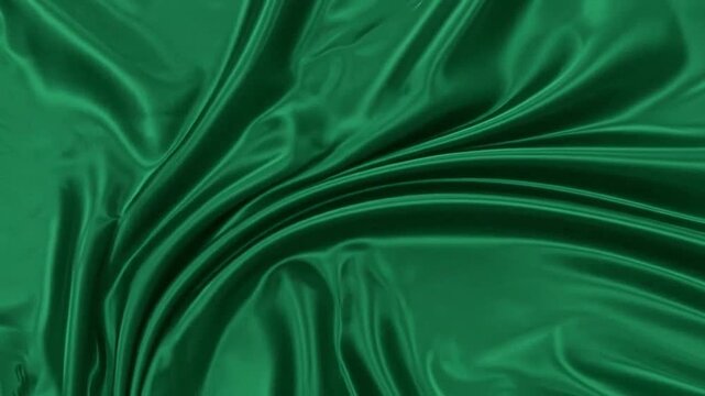 A smooth and elegant background featuring flowing dark green silk fabric