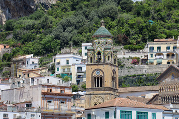 Obraz premium Amalfi Cathedral Bell Tower (Duomo di Amalfi) and Coastal Town in Italy.