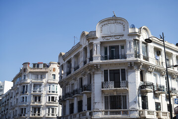 Historic colonial architecture with white Art Deco building facades in Casablanca Morocco © montassir
