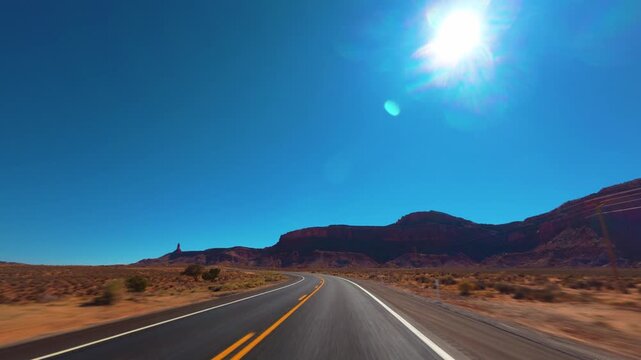 Monument Valley POV Drive on Scenic Desert Highway in the American Southwest