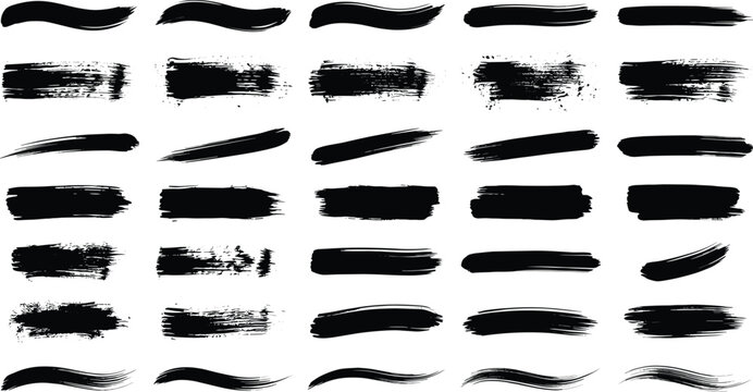 Collection of long black paint strokes with irregular rough edges and organic textures for modern designs.