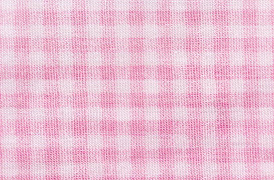 Soft focus pink gingham fabric texture