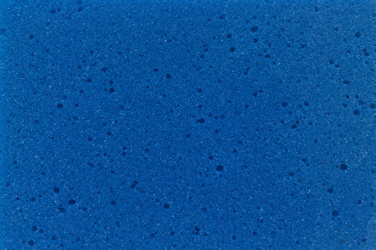 Blue foam sponge texture, macro background