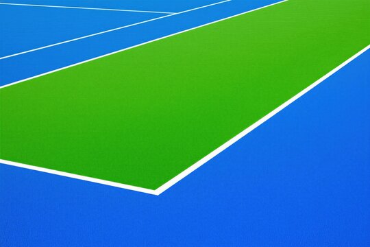 Top view of empty tennis court with bright blue, green surface. White lines mark competition area for sport match on pro stadium ground. Abstract geometric pattern creates clean minimalist background