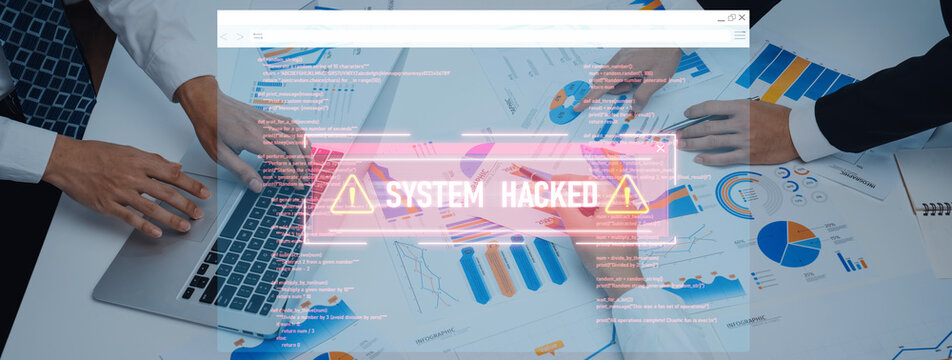 A group of business professionals analyzing data trends on a laptop, with a warning sign indicating a system hack, highlighting cybersecurity concerns. Trope