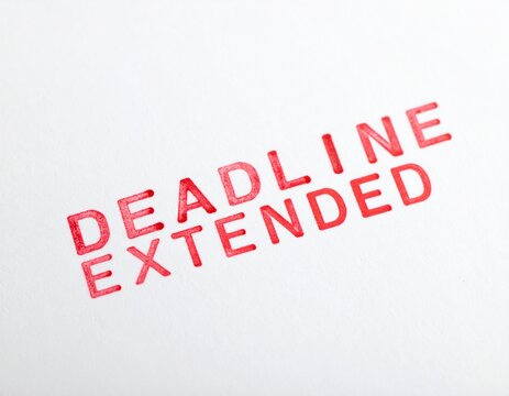&ldquo;Bold red uppercase text &lsquo;Deadline Extended&rsquo; stamped on white background, conveying formal announcement of postponed due date in academic, business, or project contexts.&rdquo;