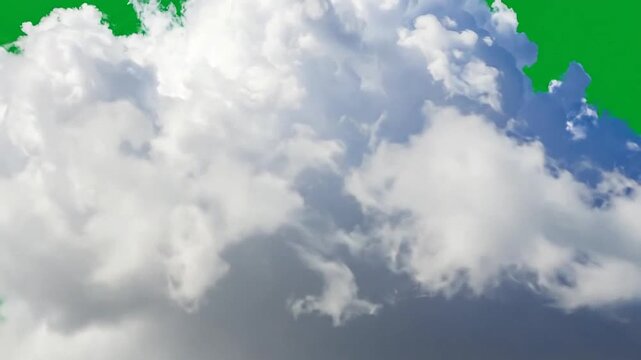 A single fluffy white cloud isolated against a vibrant green background