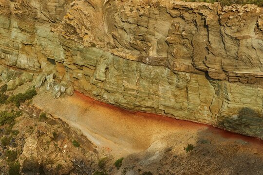 Morning light Salto la Vechia, cliff, reddish tuff, Pantelleria, Pelagic Islands, Sicily, Italy