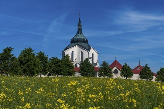 Flower field before the Unesco site Pilgrimage Church of Saint John of Nepomuk, Czech Republic