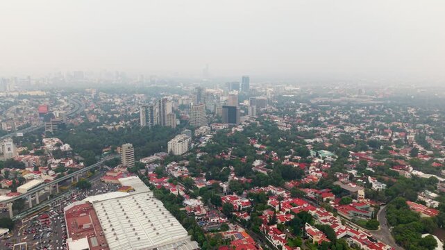 Sweeping aerial landscape of San Jer&oacute;nimo with Monumental Mexican Flag, CDMX 