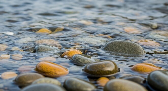 Smooth Wet Pebbles in Flowing Water