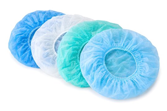 Disposable Sterile Surgical Caps with Elastic Edges Isolated on White Background