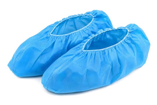Disposable Medical Shoe Covers Made from Nonwoven Protective Material Isolated on White Background