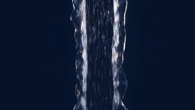 Water flows down in the night.