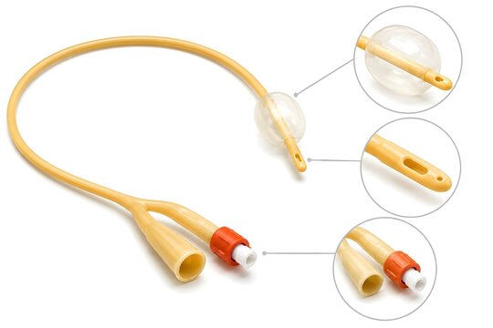 Foley urinary catheter with magnified component details isolated on white background